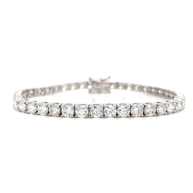 14K white gold tennis bracelet set with (49) round diamonds totaling 8