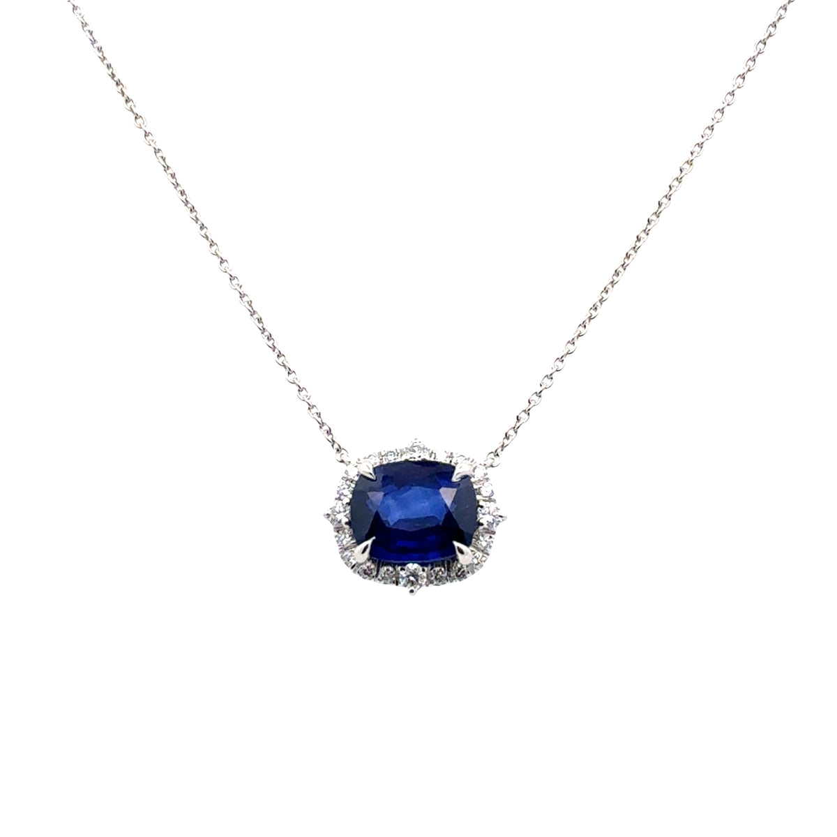 Blue Sapphire and Diamond Halo Pendant
