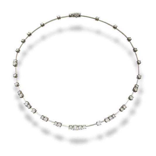 Platinum  wire necklace set with (41) round diamonds totaling 6.45cts,