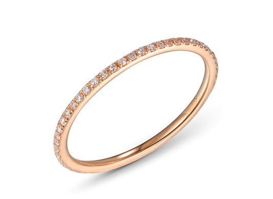 14K rose gold  eternity band, set with (48) round diamonds totaling .1