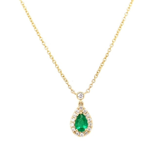 14K yellow gold halo pendant set with (1) pear shaped emerald weighing